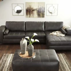 Signature Design By Ashley® Nokomis - Gray Dark - Laf Sofa & Raf Chaise Sectional Sectionals