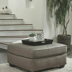 Benchcraft® Calicho - Cashmere - 2 Pc. - Chair With Ottoman