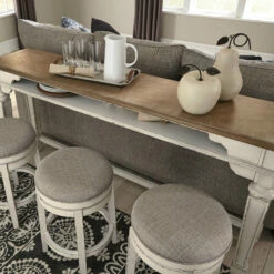 Signature Design By Ashley® Realyn - White - 4 Pc. - Long Counter Table, 3 Swivel Stools