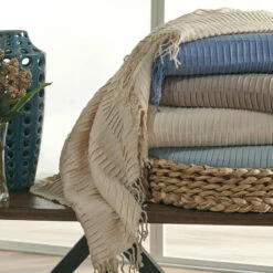 Ashley Furniture Mendez - Taupe - Throw (3/cs)