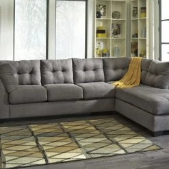 Benchcraft® Sectionals Maier - Gray Dark - Laf Sofa & Raf Chaise Sectional