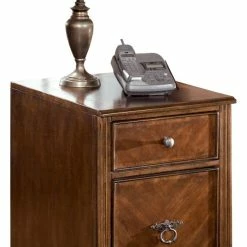 Ashley Furniture Cabinets Hamlyn - Medium Brown - File Cabinet