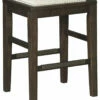 Discount โ Ashley Furniture Hallishaw - Dark Brown - Upholstered Stool (1/cn) Stools ๐คฉ 1 Ashley Furniture Hallishaw - Dark Brown - Upholstered Stool (1/cn) Stools