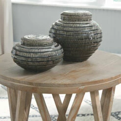 Ashley Furniture Glasslore - Light Grayish Brown - Round End Table Tables