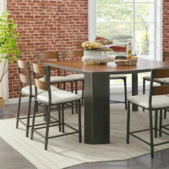 Signature Design By Ashley® Stellany - Dark Brown - 9 Pc. - Counter Table, 8 Upholstered Barstools Dining Room Sets