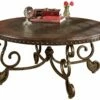Ashley Furniture Tables Rafferty - Dark Brown - Round Cocktail Table