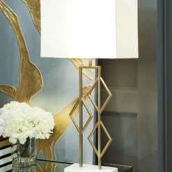 Ashley Furniture Edsel - Champagne/white - Metal Table Lamp (1/cn) Accessories