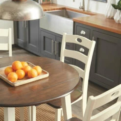 Ashley Furniture Tables Woodanville - Light Brown - Round Drm Drop Leaf Table