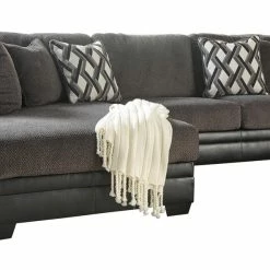 Benchcraft® Sectionals Kumasi - Gray Dark - Laf Chaise & Raf Sofa Sectional