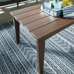 Signature Design By Ashley® Emmeline - Brown - Rectangular Cocktail Table