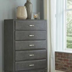 Ashley Furniture Caitbrook - Gray - Five Drawer Chest Chests