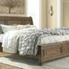 Signature Design By Ashley® Flynnter - Medium Brown - Queen Storage Sleigh Bed Beds