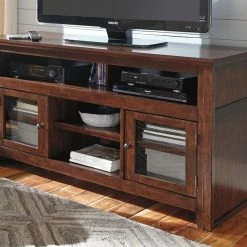 Ashley Furniture Harpan - Reddish - Best In Class TV Stand