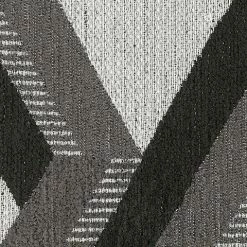 Benchcraft® Sectionals Kumasi - Gray Dark - Laf Sofa & Raf Chaise Sectional