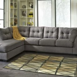 Benchcraft® Maier - Gray Dark - Laf Chaise & Raf Sofa Sectional