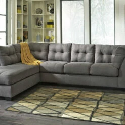 Benchcraft® Maier - Gray Dark - 3 Pc. - Lafr Chaise & Raf Sofa Sectional & Accent Ottoman Living Room Sets