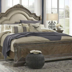 Signature Design By Ashley® Charmond - Brown - Queen Upholstered Sleigh Bed