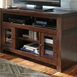 Ashley Furniture Harpan - Reddish - Best In Class TV Stand