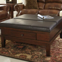 Ashley Furniture Gately - Medium Brown - Ottoman Cocktail Table