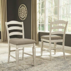 Ashley Furniture Stools Realyn - Chipped White - Upholstered Barstool (2/cn)