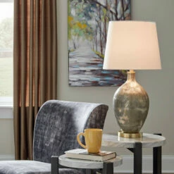 Ashley Furniture Jemarie - Gray/gold Finish - Glass Table Lamp (1/cn) Accessories
