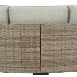 Ashley Furniture Loveseats Calworth - Beige - Curved Loveseat With Cushion