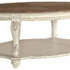 Ashley Furniture Tables Realyn - White/brown - Oval Cocktail Table
