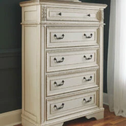 Ashley Furniture Chests Realyn - White / Brown / Beige - Five Drawer Chest