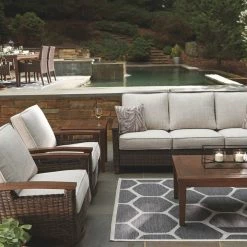 Ashley Furniture Paradise - Medium Brown - Sofa With Cushion Sofas